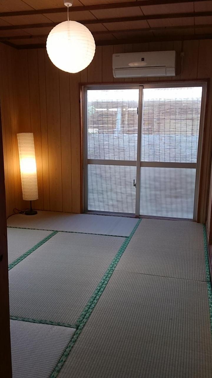 石垣島 一棟貸切りのお宿 ちゅら赤瓦 Ishigaki  Номер фото